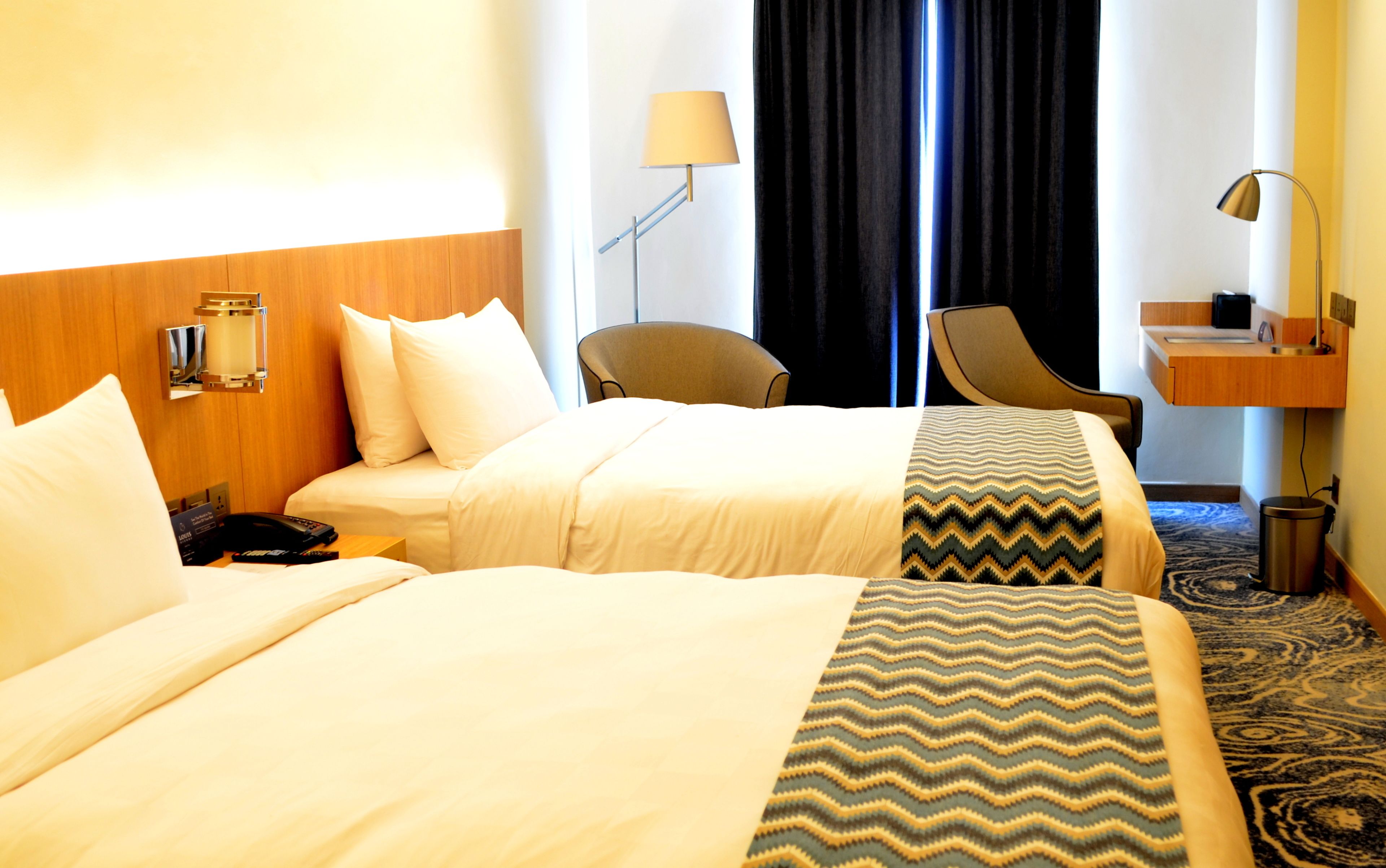 Premium bedding, in-room safe, desk, free wired internet