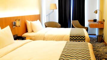 Premium bedding, in-room safe, desk, free wired internet