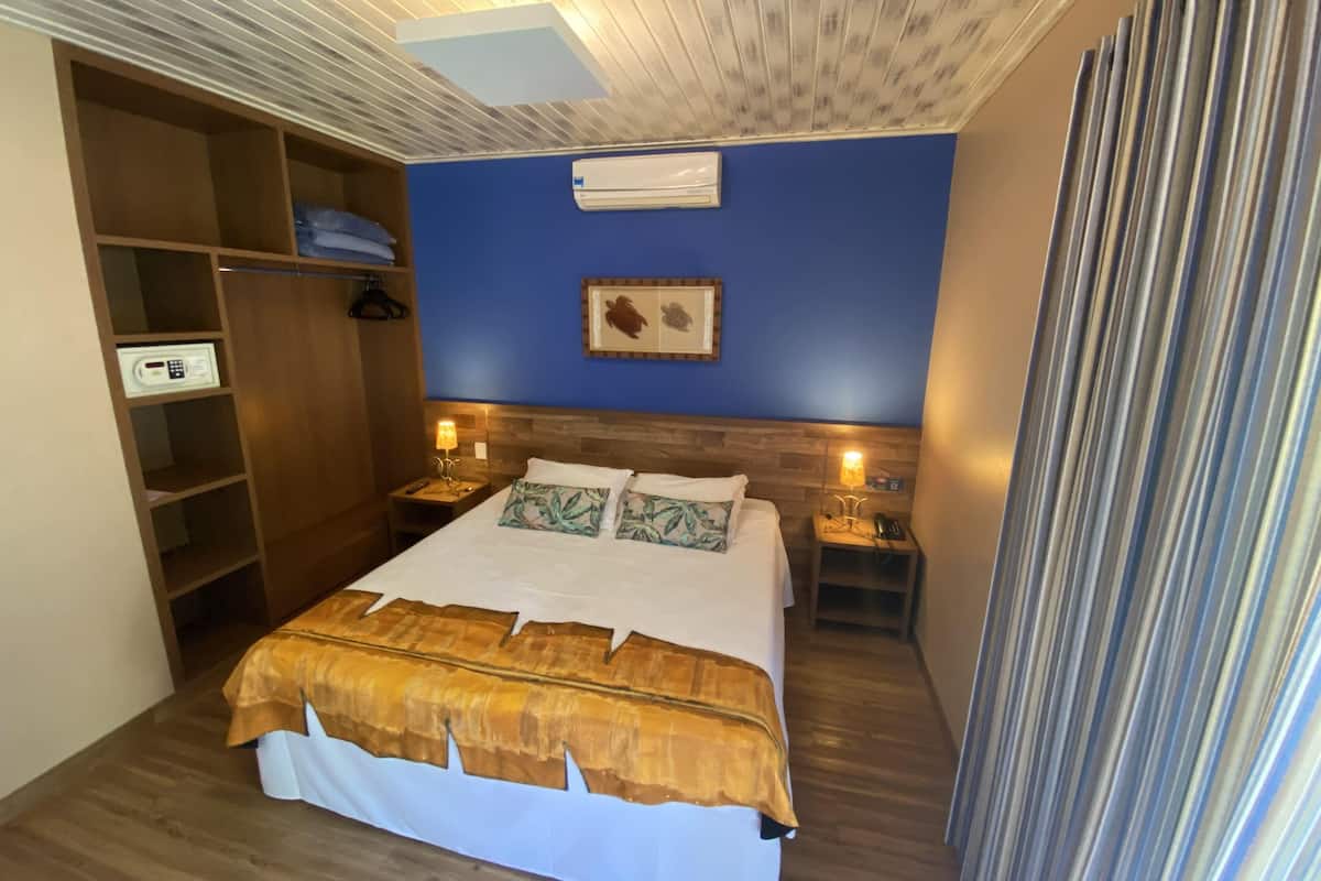 Luxe beddengoed, een minibar, een kluis op de kamer, een laptopwerkplek