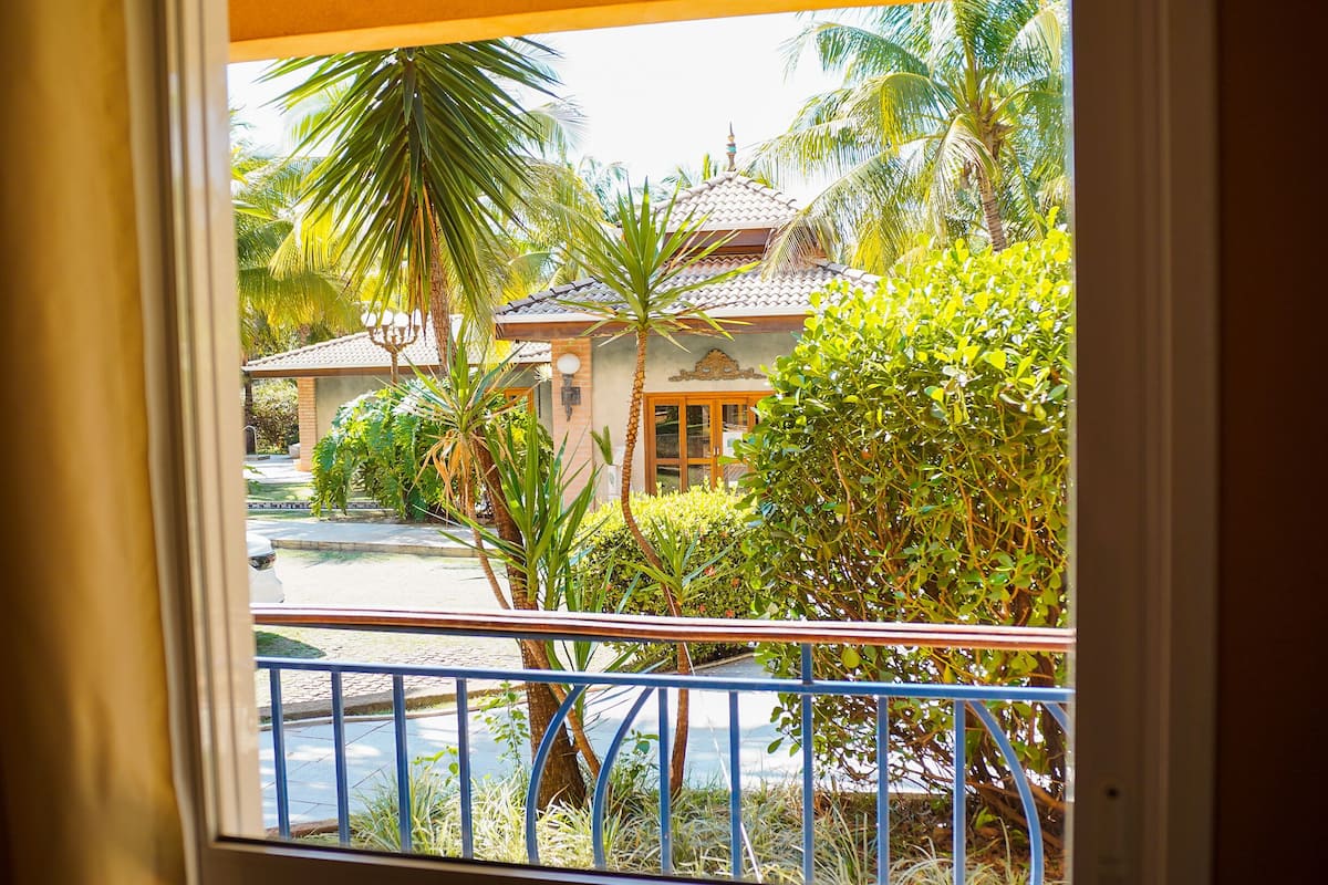 Quarto superluxo, Vista para o jardim - Incluso acesso ao Parque Aquático Hot Beach Olímpia | Luxe beddengoed, een minibar, een kluis op de kamer, een laptopwerkplek