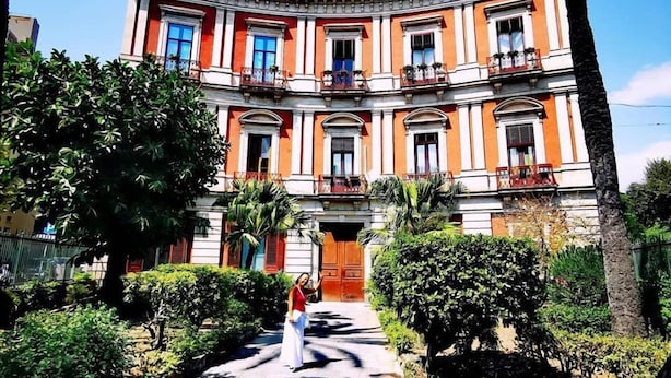 A multi-story building with a symmetrical facade, large windows, and a central entrance. - Bellini Home B&B (Catania)