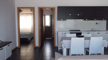 Ático, 1 habitación, vistas al mar | Sala de estar
