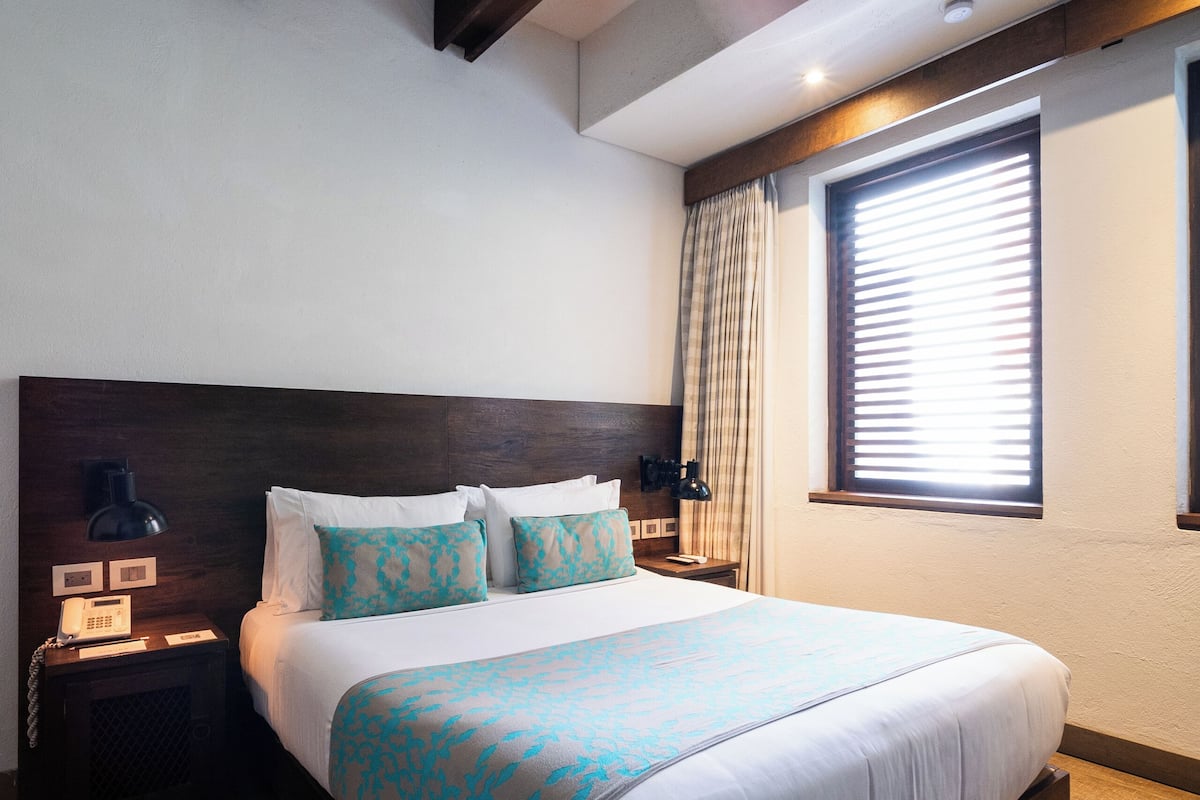 Ropa de cama de alta calidad y minibar