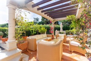 Apartment, 3 Bedrooms, Hot Tub, Partial Sea View (Ground floor) | Terrace/patio - Dunas Douradas Beach Club (Loulé)