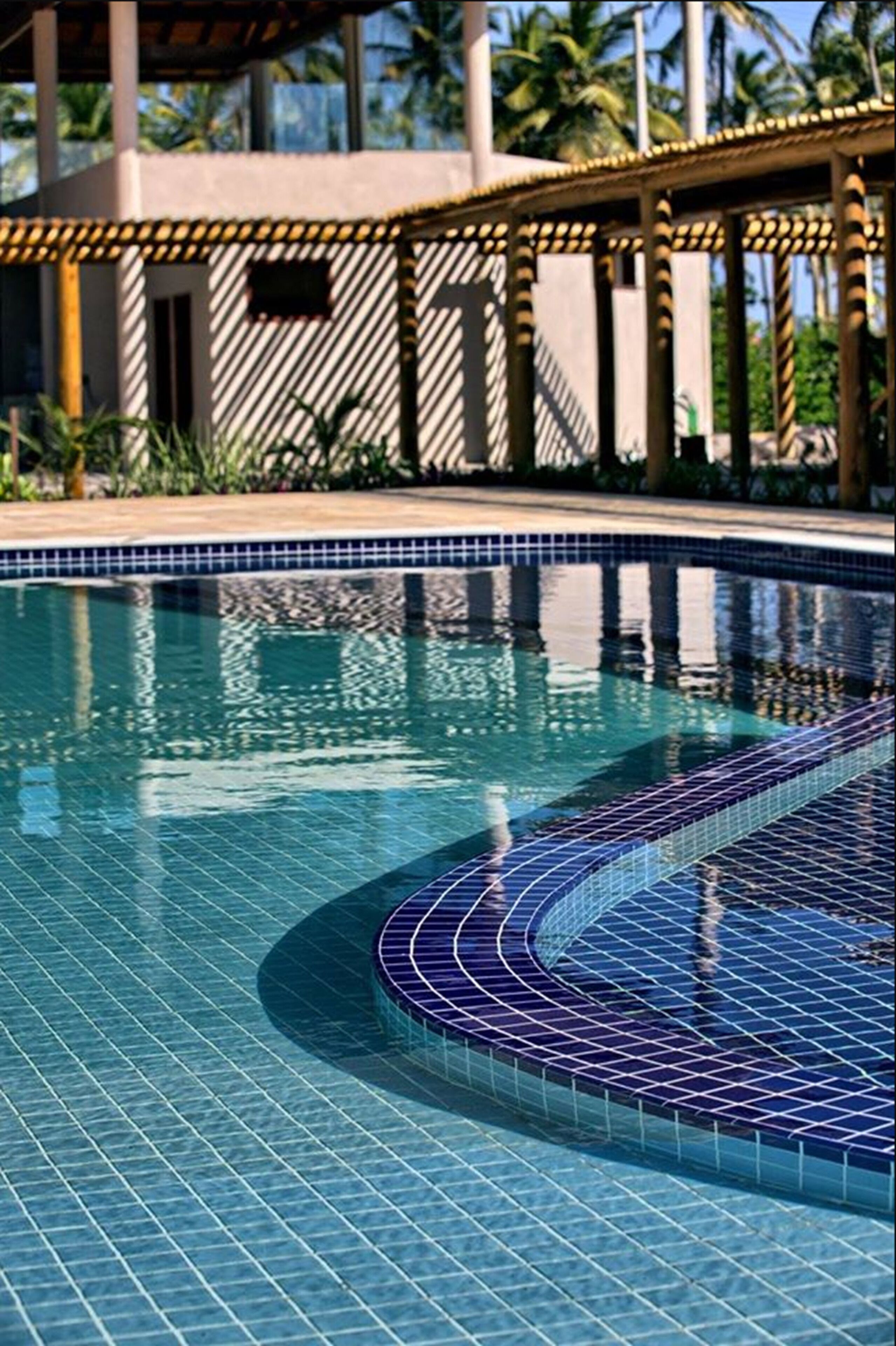 2 outdoor pools, pool umbrellas, pool loungers