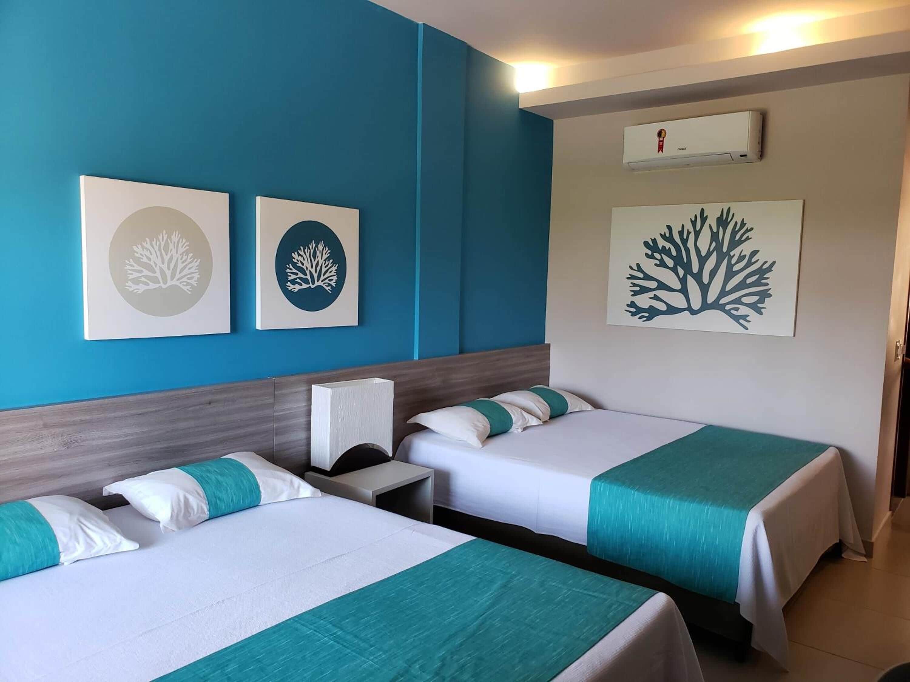 quadruple room | minibar, in-room safe, blackout curtains, free wifi