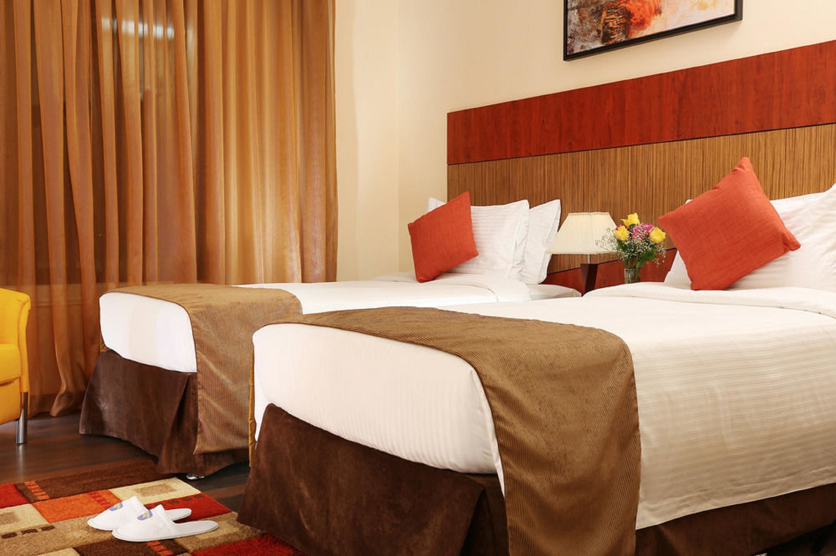 standard room, 2 single beds | minibar, in-room safe, free cots/infant beds, rollaway beds