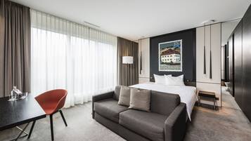 Junior Suite | 1 bedroom, premium bedding, in-room safe, desk