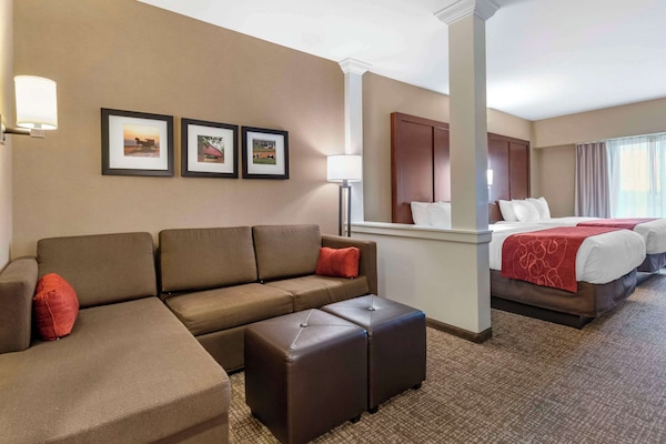 Premium bedding, desk, laptop workspace, iron/ironing board