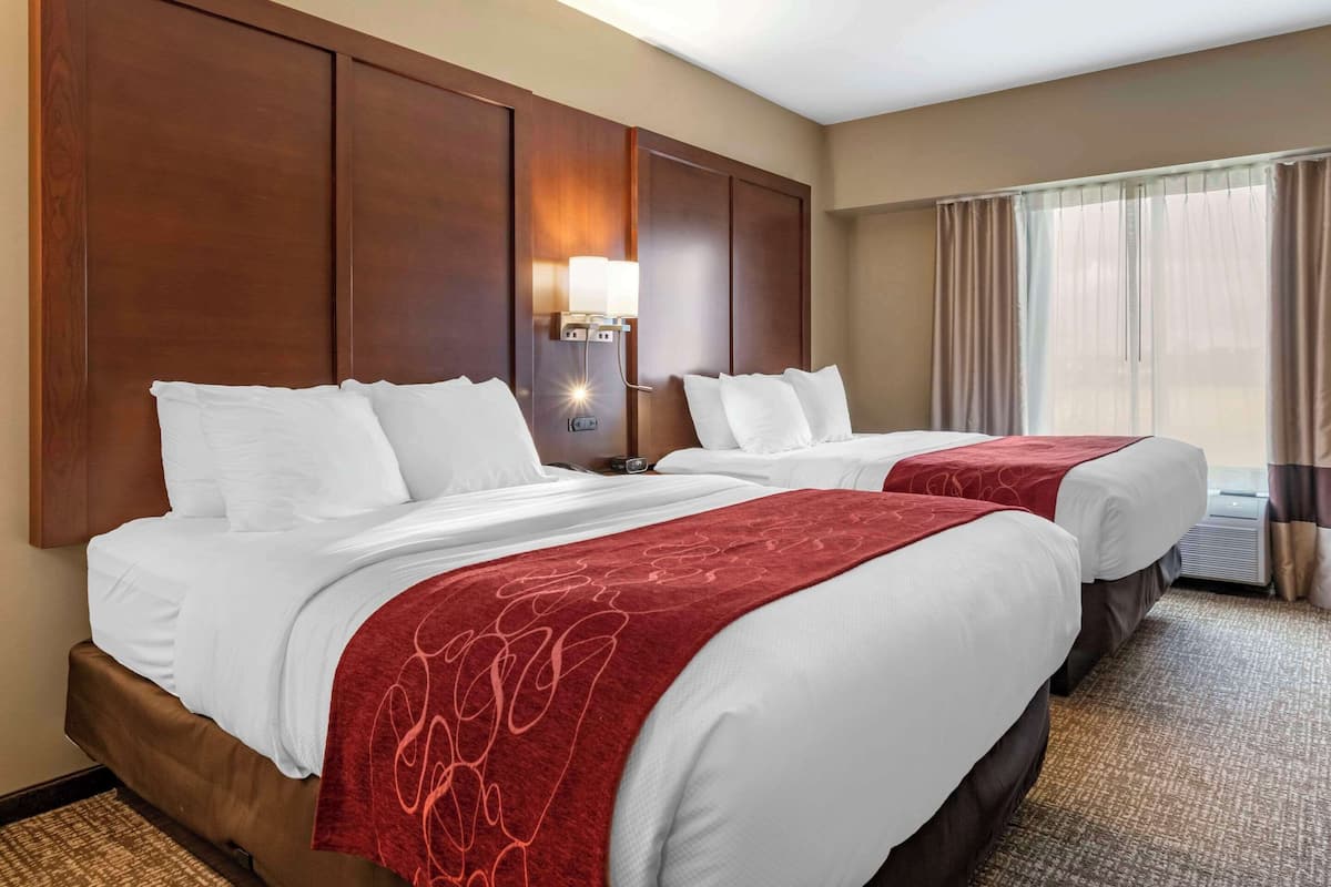 Premium bedding, desk, laptop workspace, iron/ironing board