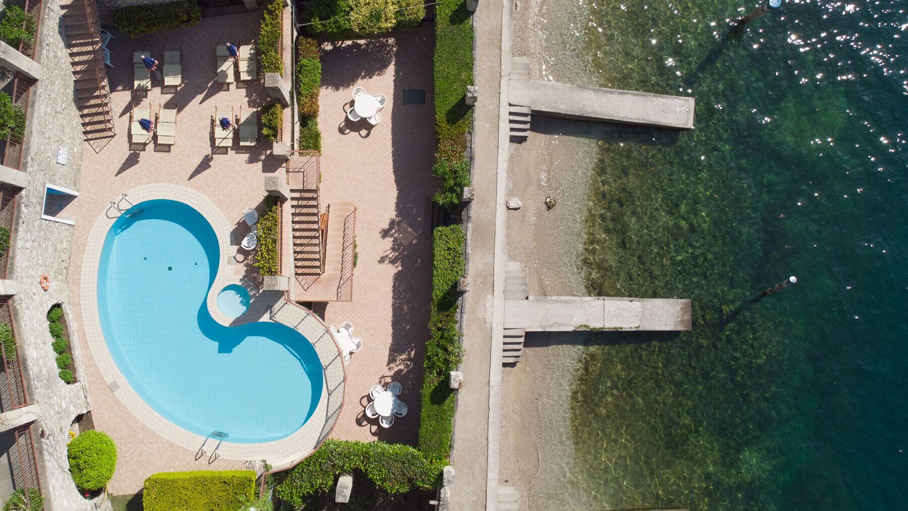 outdoor pool, pool umbrellas, pool loungers