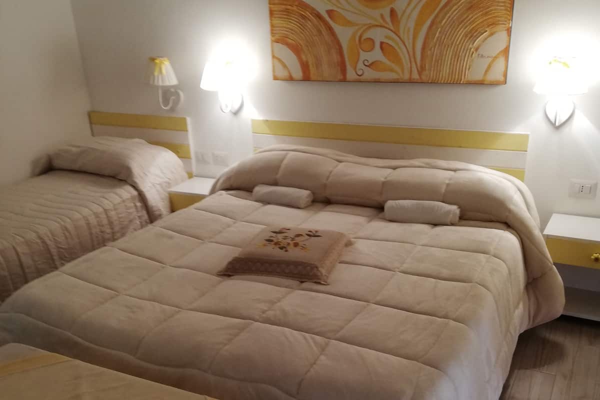 Quadruple Room | Egyptian cotton sheets, premium bedding, down comforters, pillowtop beds