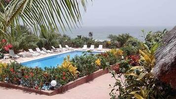 Outdoor pool, pool umbrellas, pool loungers