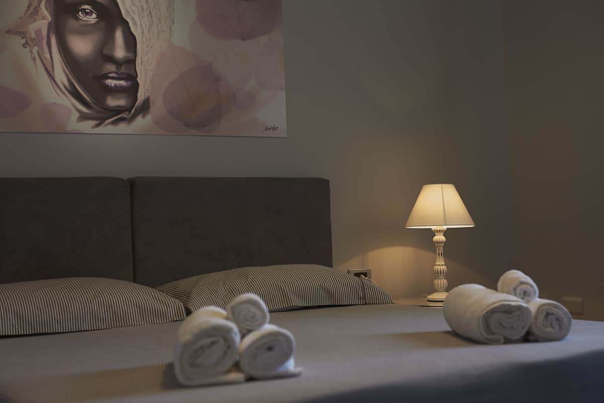 Chambre quadruple panoramique, vue sur lâocĂ©an | Draps italiens de Frette, literie de qualitĂ©, couette en duvet