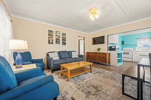 Deluxe Cottage | Living area - Oceanside Court by Kees Vacations (Nags Head)