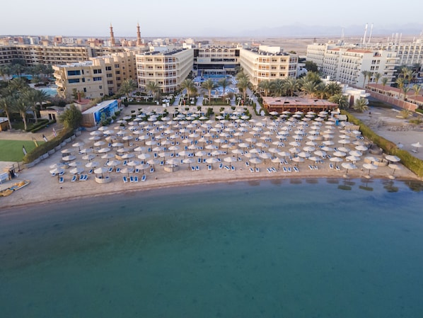 Private beach, beach umbrellas, beach towels, scuba diving