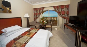 Premium Room, Partial Sea View | Down comforters, minibar, in-room safe, desk