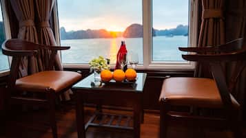 Deluxe Triple Room, Sea View | Pillowtop beds, blackout drapes, bed sheets