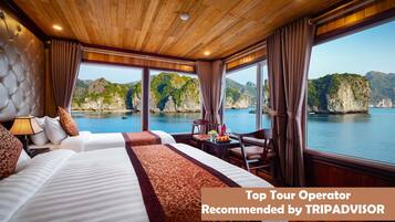 Chambre Triple Deluxe, vue mer | Surmatelas, rideaux occultants, draps fournis