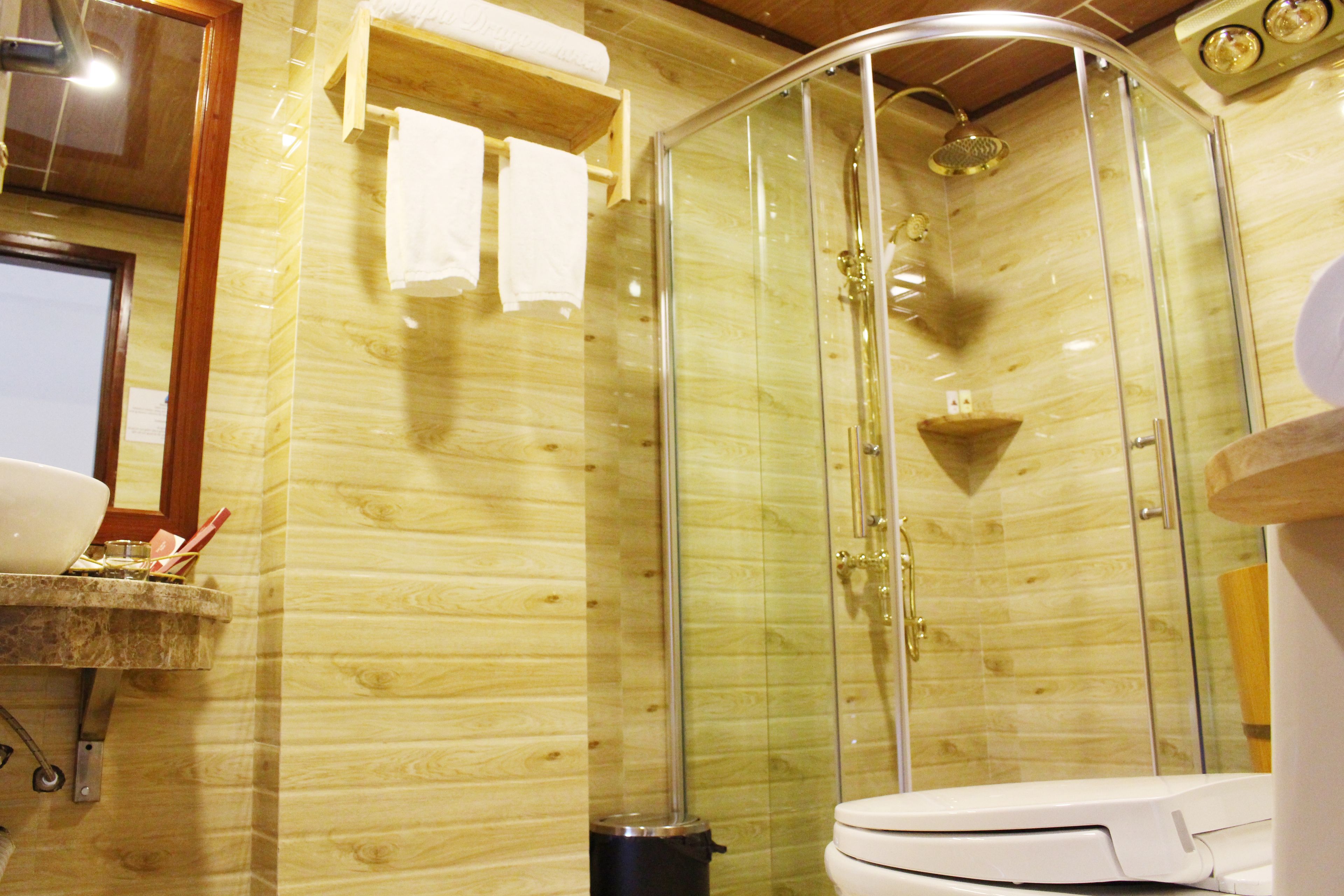 superior twin room | bathroom | shower, free toiletries, hair dryer, slippers