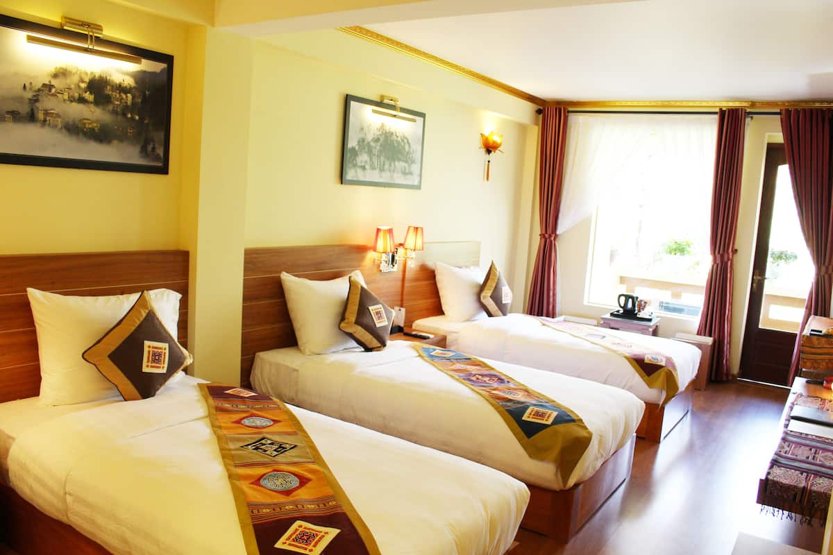 superior triple room | minibar, in-room safe, desk, blackout curtains