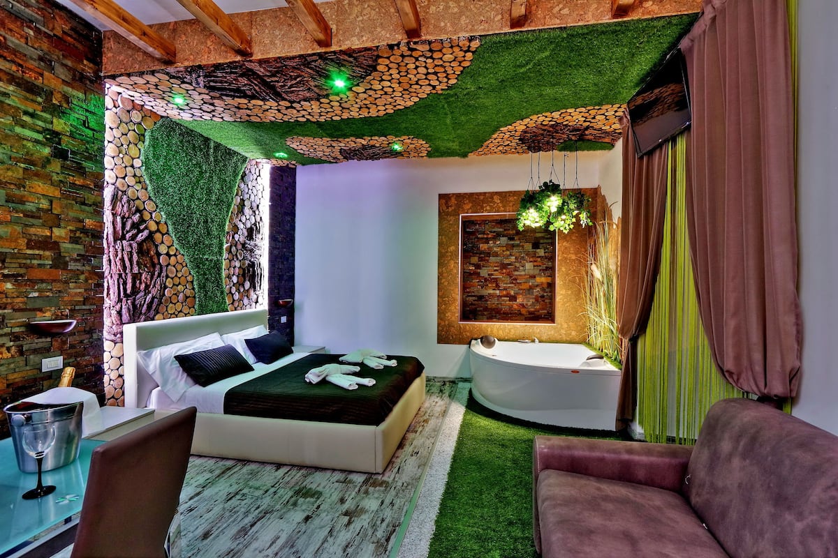 Suite, idromassaggio (King) | Biancheria da letto di alta qualità, minibar, una cassaforte in camera