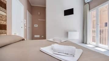 Camera Comfort con letto matrimoniale o 2 letti singoli | 1 camera, una scrivania, postazione laptop, Wi-Fi gratuito