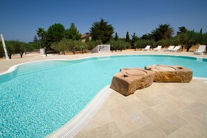 Outdoor pool, pool umbrellas, sun loungers