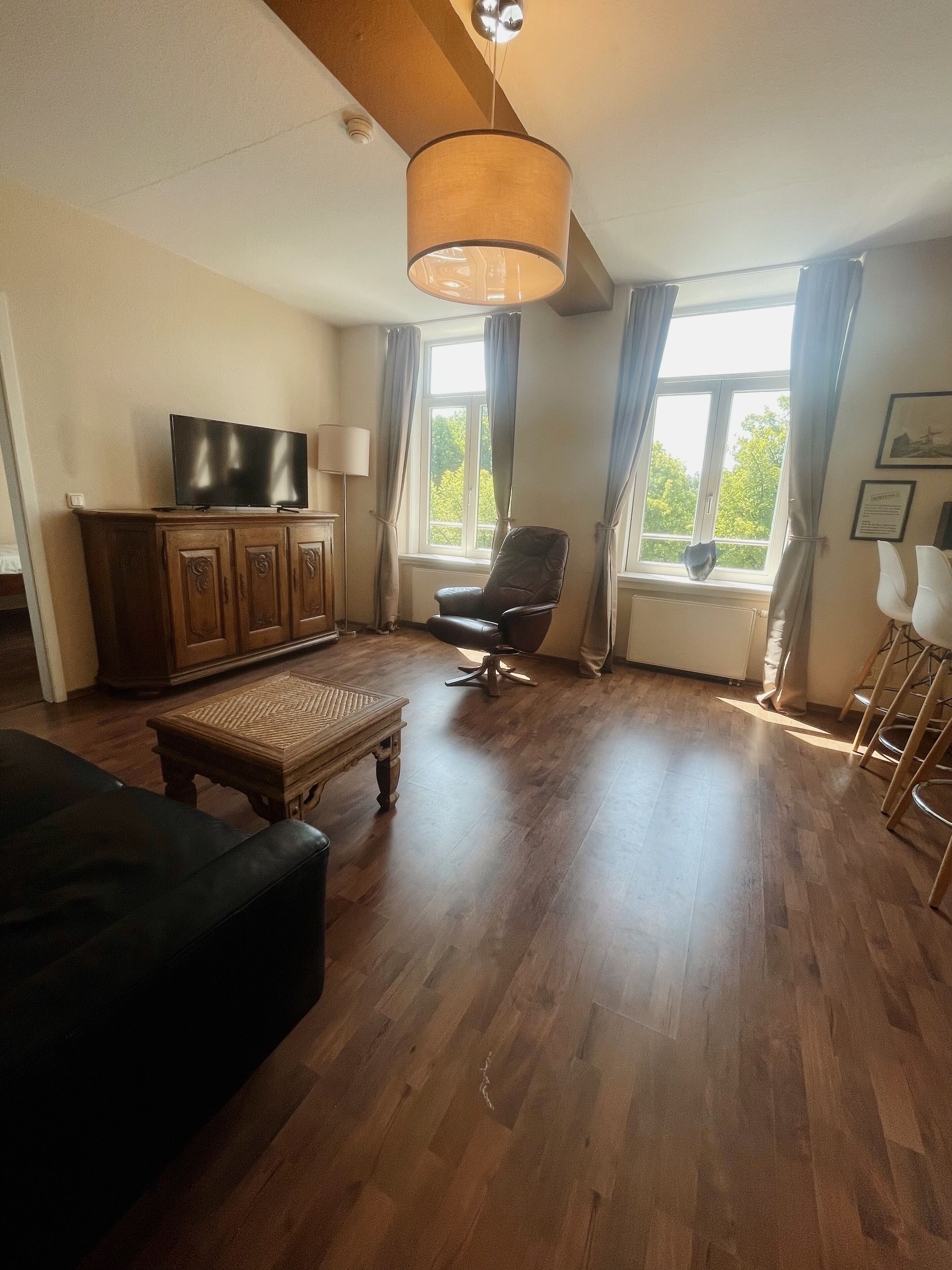 apartment antonie, 1 bedroom, river view, final cleaning fee 35€ (an der untertrave 106)  | living area | 40-inch tv with cable channels