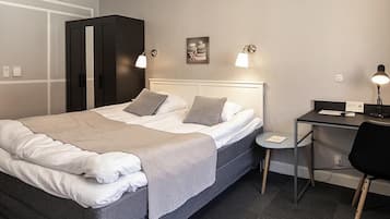 Ropa de cama hipoalergénica, cortinas blackout y wifi gratis