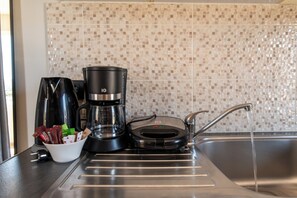 Family Apartment, 1 Bedroom | 1 bedroom, blackout drapes, cribs (free), WiFi (free)