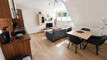 Standard Apartment, 2 Bedrooms, 2 Bathrooms, Garden View | Living area | 32-inch Smart TV with satellite channels