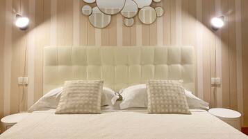 Deluxe Quadruple Room, 1 Bedroom, Private Bathroom | Premium bedding, minibar, desk, free WiFi