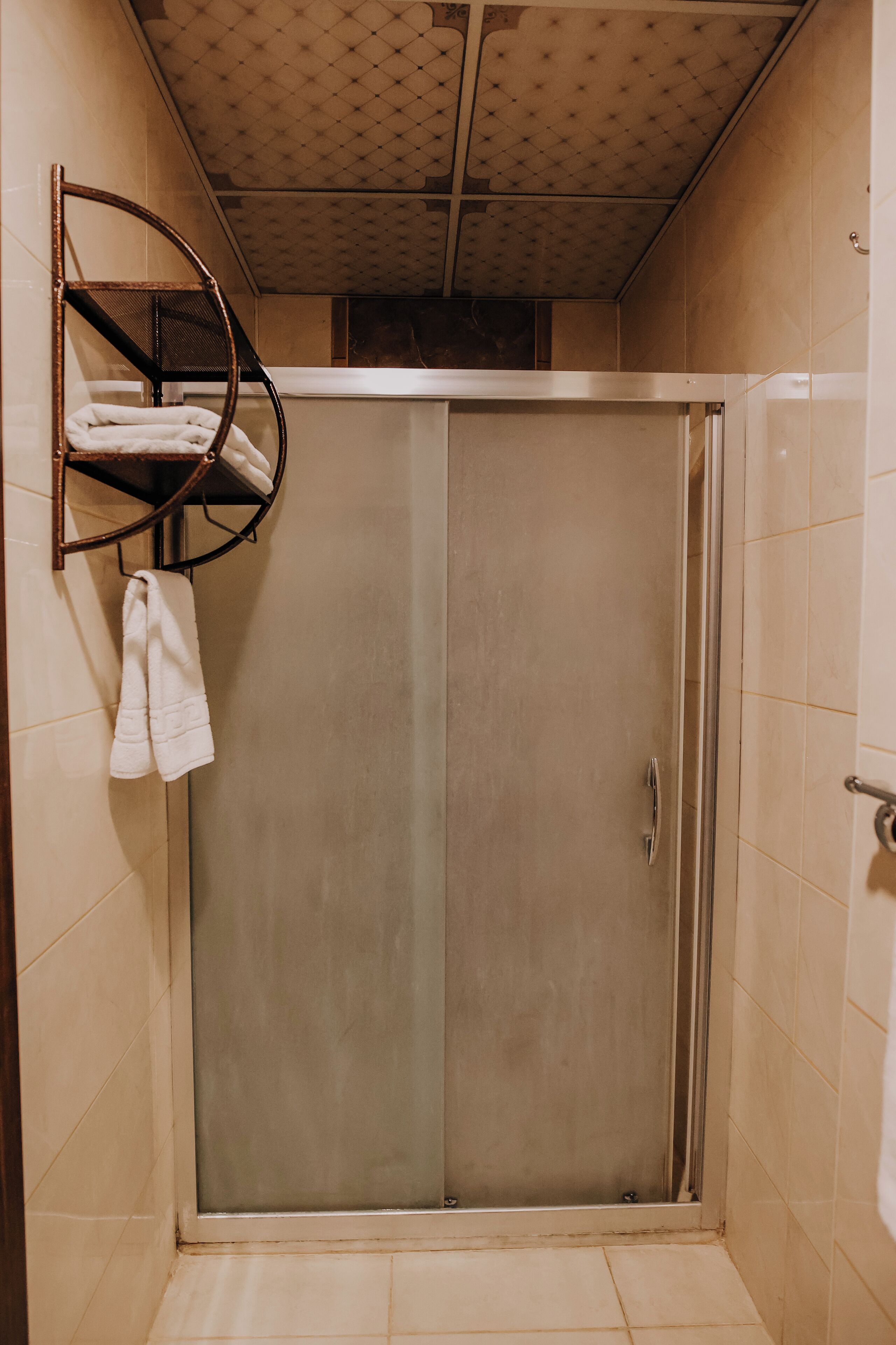 deluxe quadruple room | bathroom | shower, free toiletries, hair dryer, towels