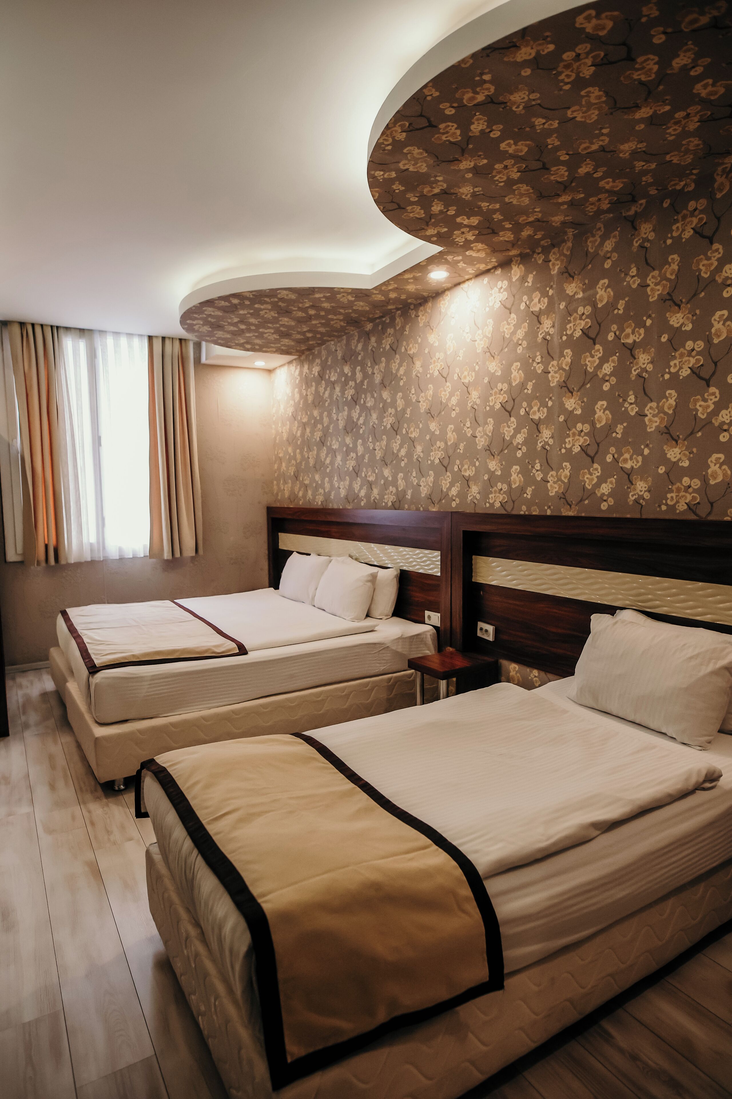 deluxe quadruple room | 1 bedroom, minibar, in-room safe, desk