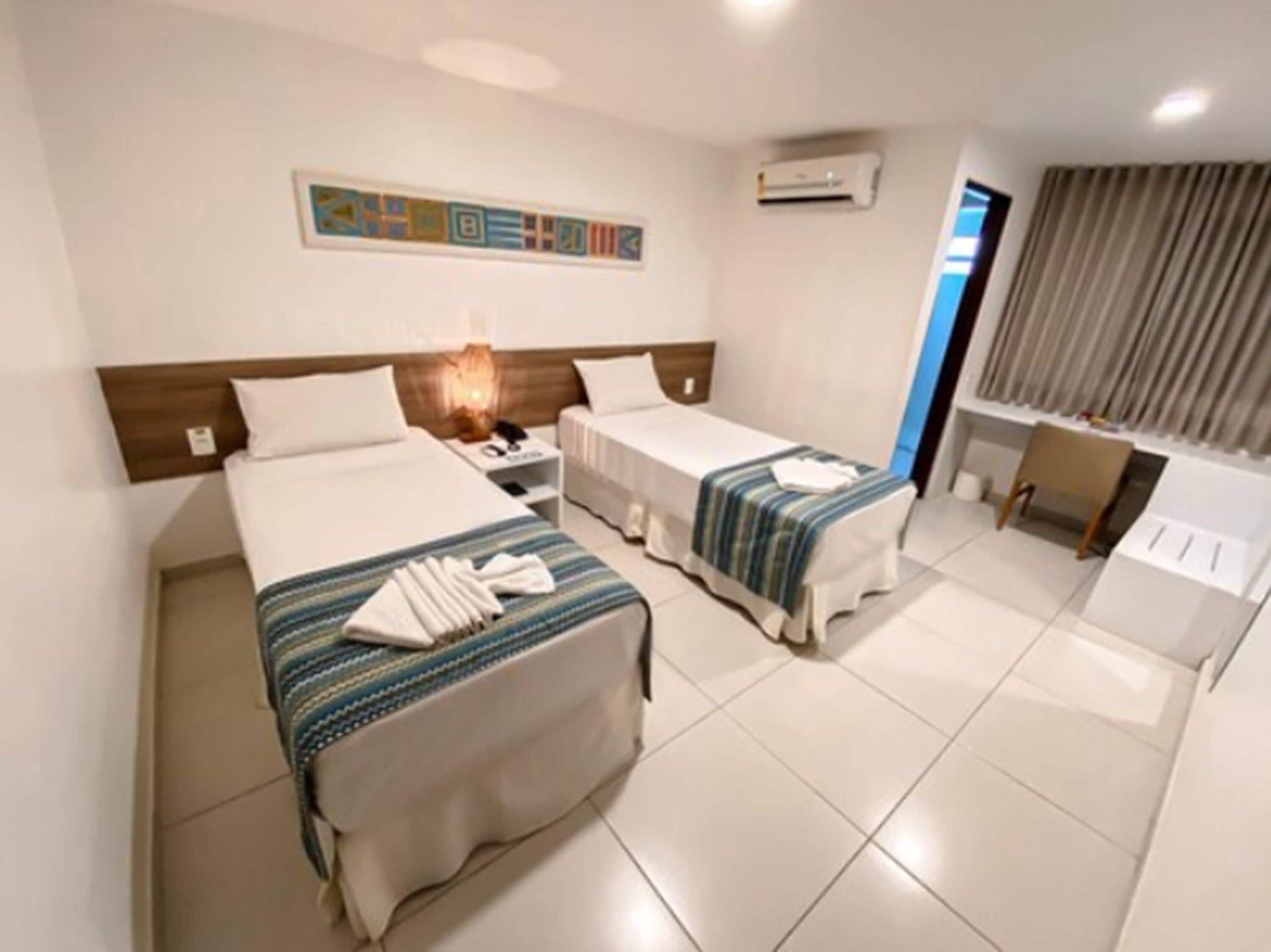 standard twin room, 2 single beds | minibar, in-room safe, desk, free wifi