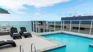 Outdoor pool, sun loungers