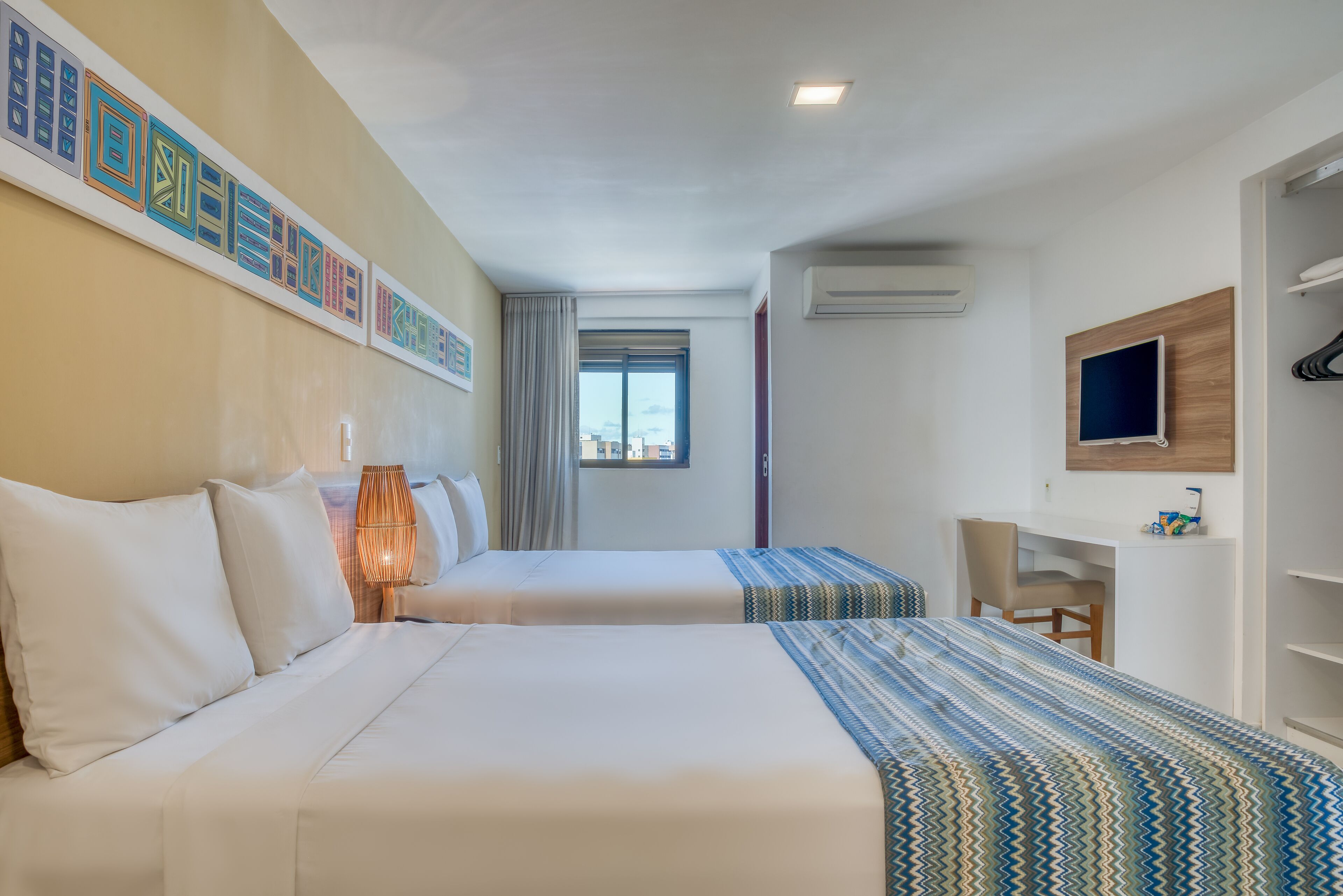 Quarto família | Frigobar, cofres nos quartos, escrivaninha, Wi-Fi de cortesia