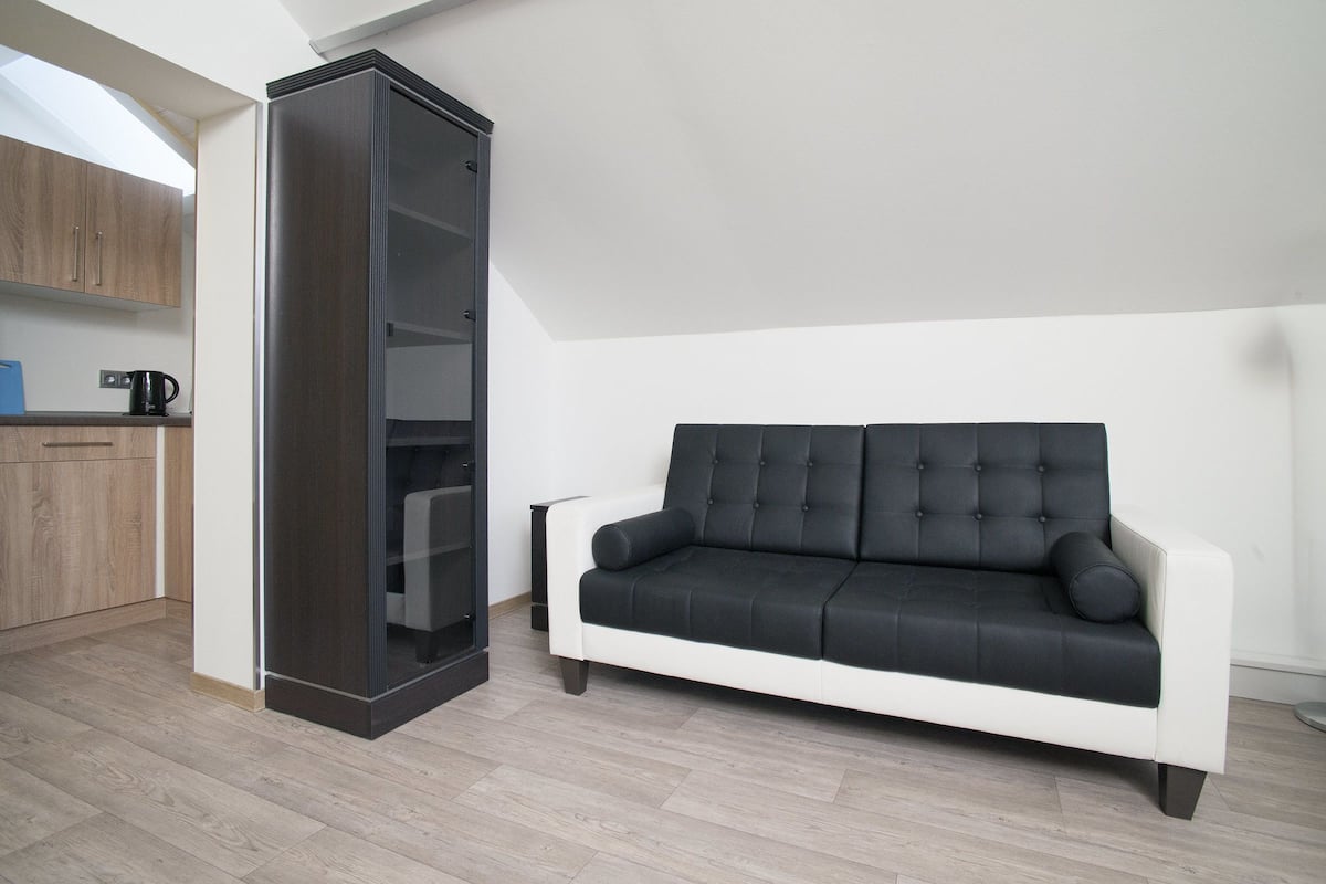 Classic Double Room | Living area | Flat-screen TV
