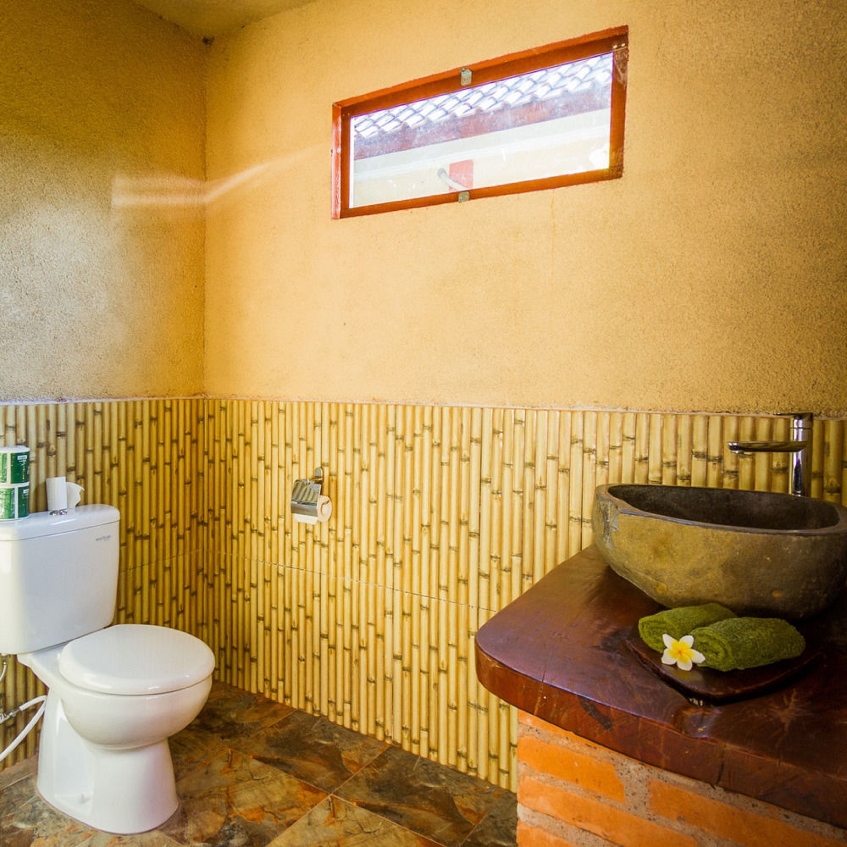 deluxe bungalow, 1 double bed, garden view | bathroom | shower, free toiletries, hair dryer, towels