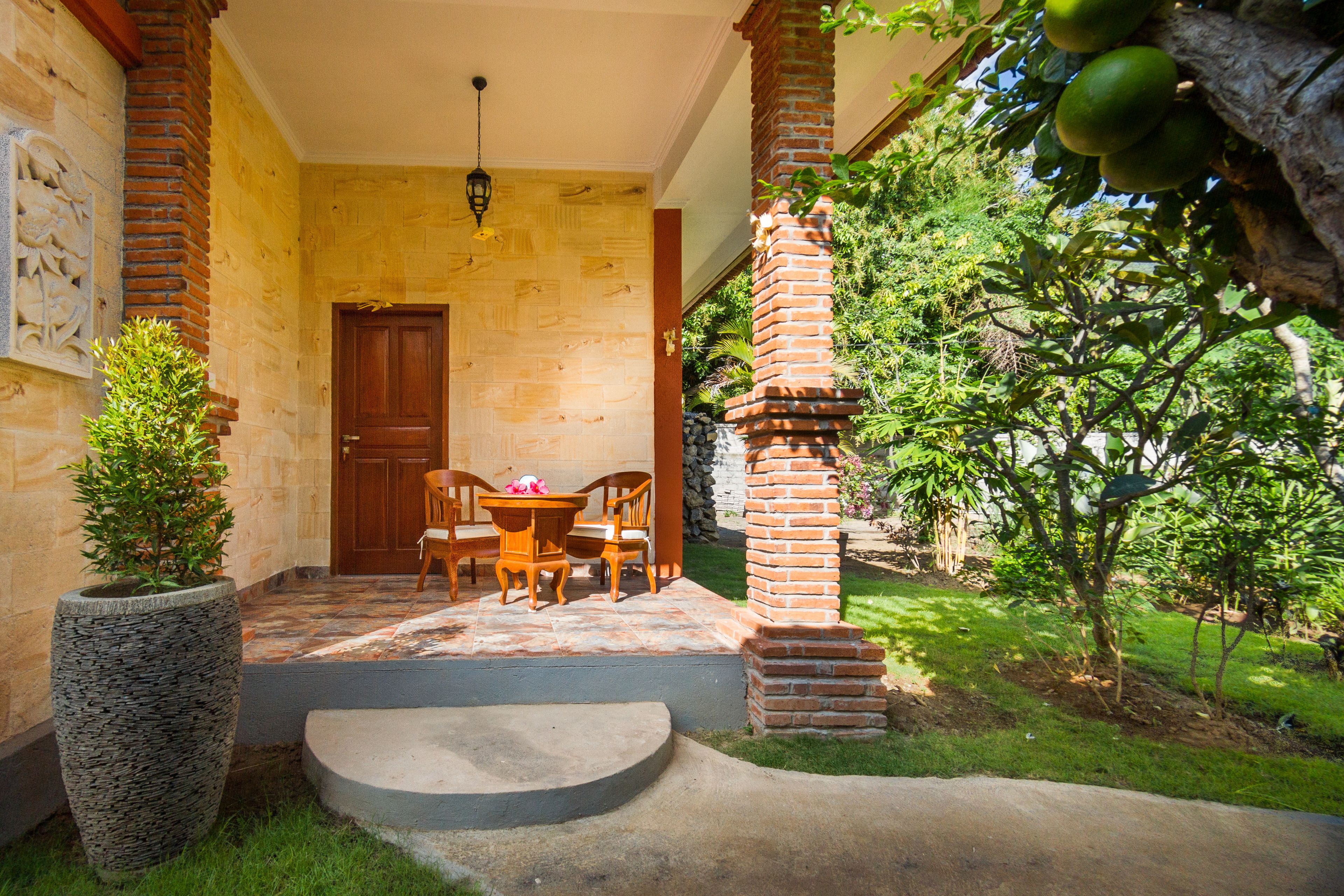 deluxe bungalow, 1 double bed, garden view | terrace/patio