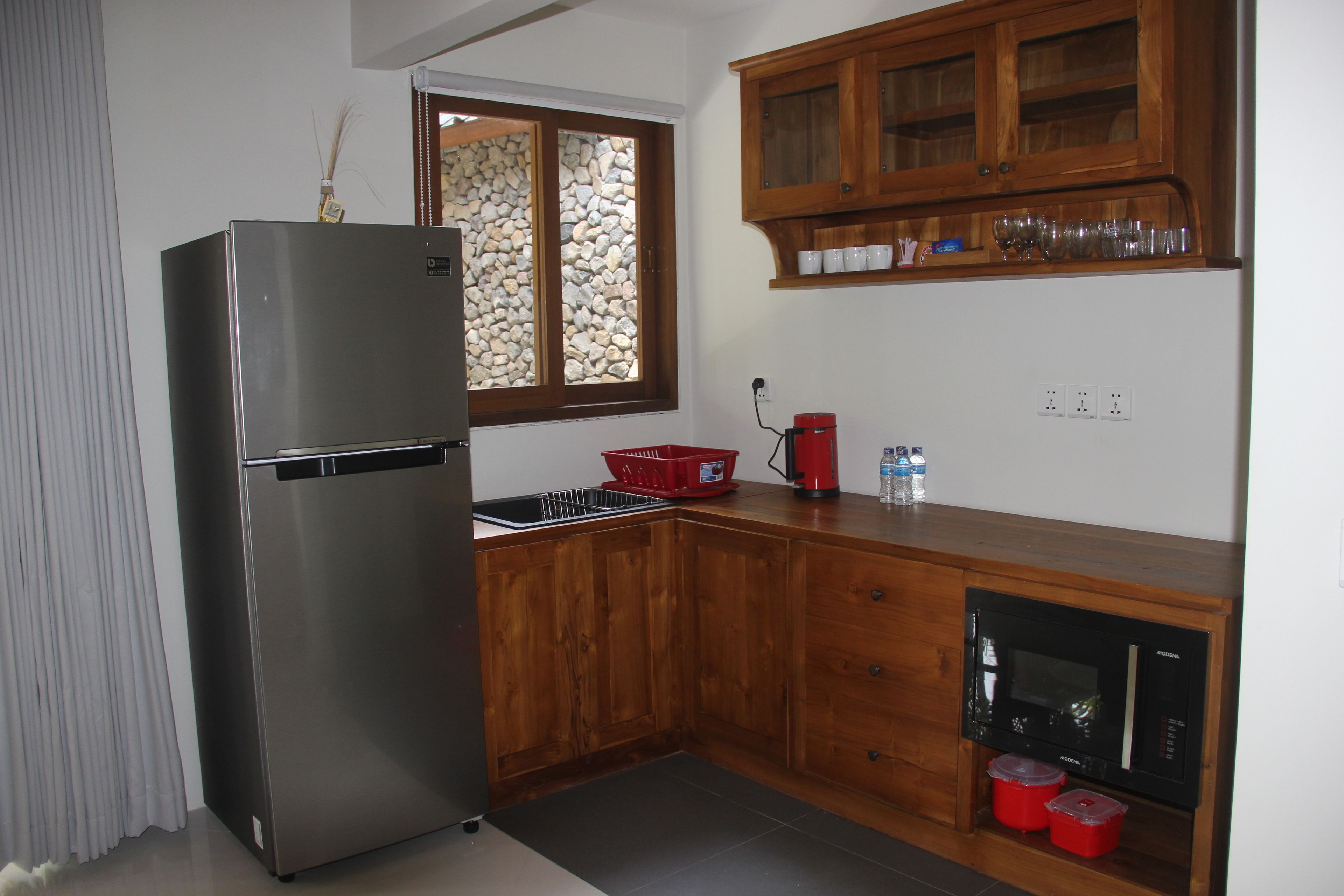 family room, garden view | private kitchen | coffee/tea maker