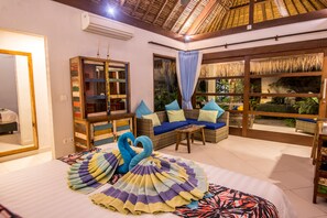 Deluxe Garden Suite | Minibar, in-room safe, cribs/infant beds, rollaway beds