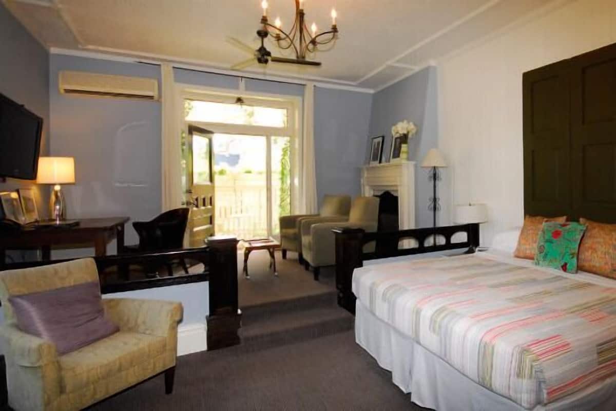 Room, 1 King Bed | Individually decorated, individually furnished, desk, iron/ironing board