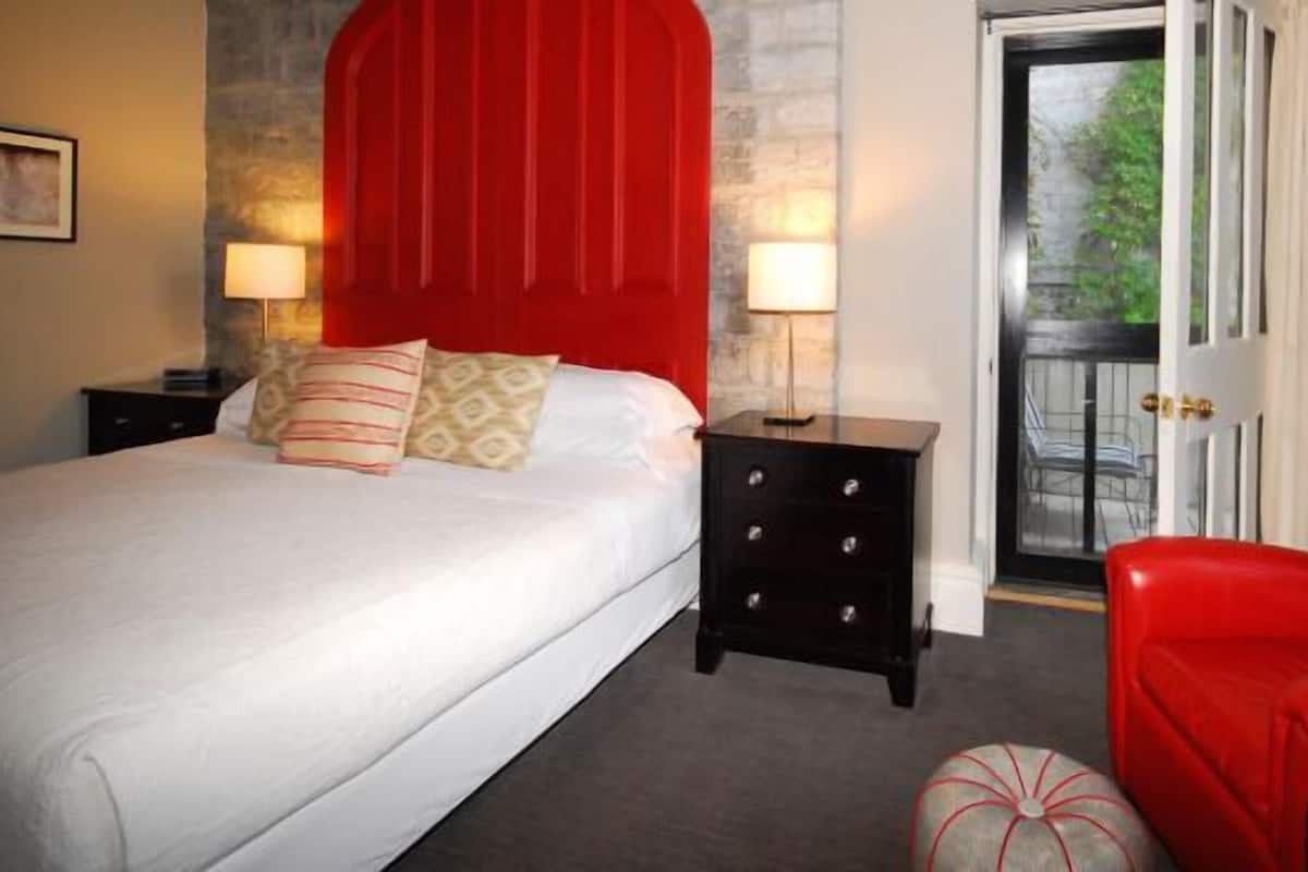 Room, 1 King Bed | Individually decorated, individually furnished, desk, iron/ironing board