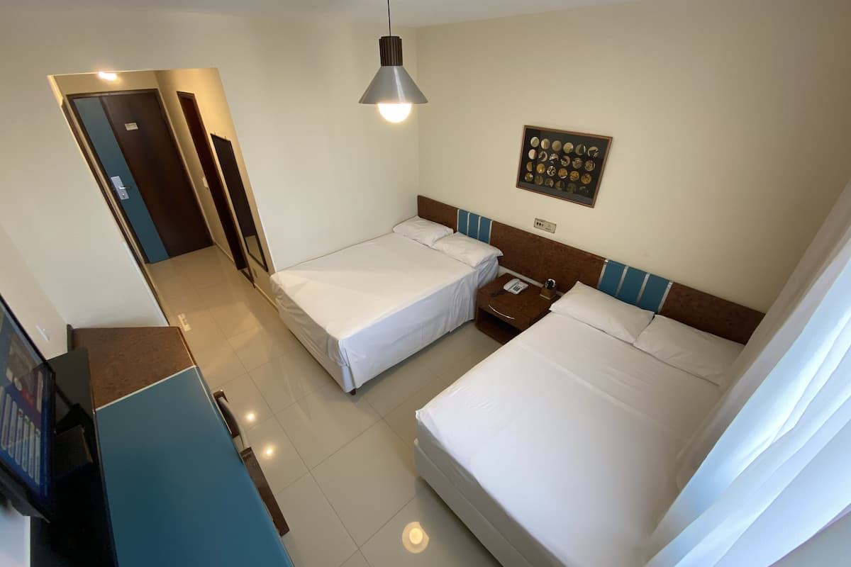 deluxe twin room, 2 single beds | minibar, desk, blackout curtains, soundproofing