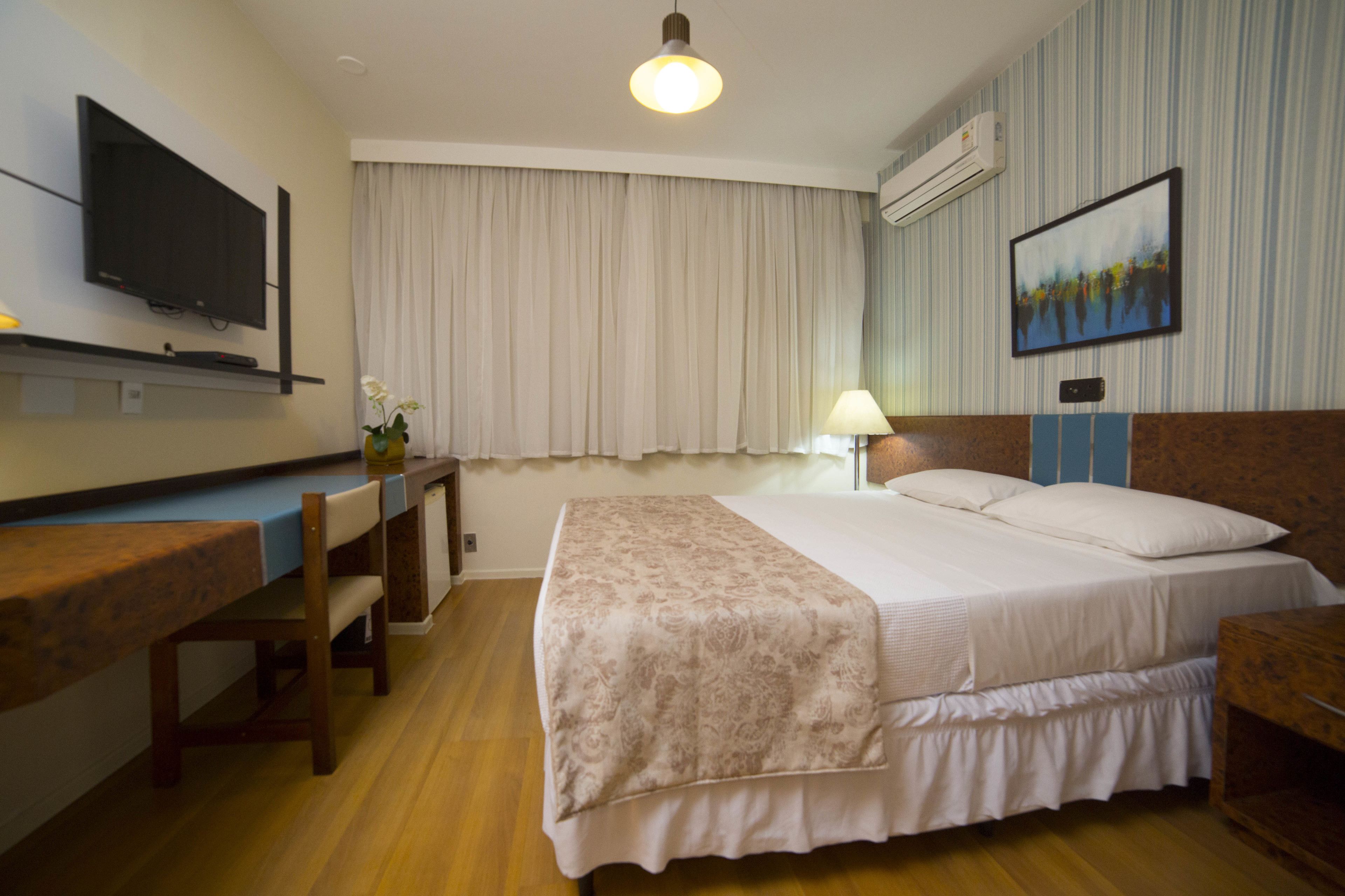 deluxe double room | minibar, desk, blackout curtains, soundproofing