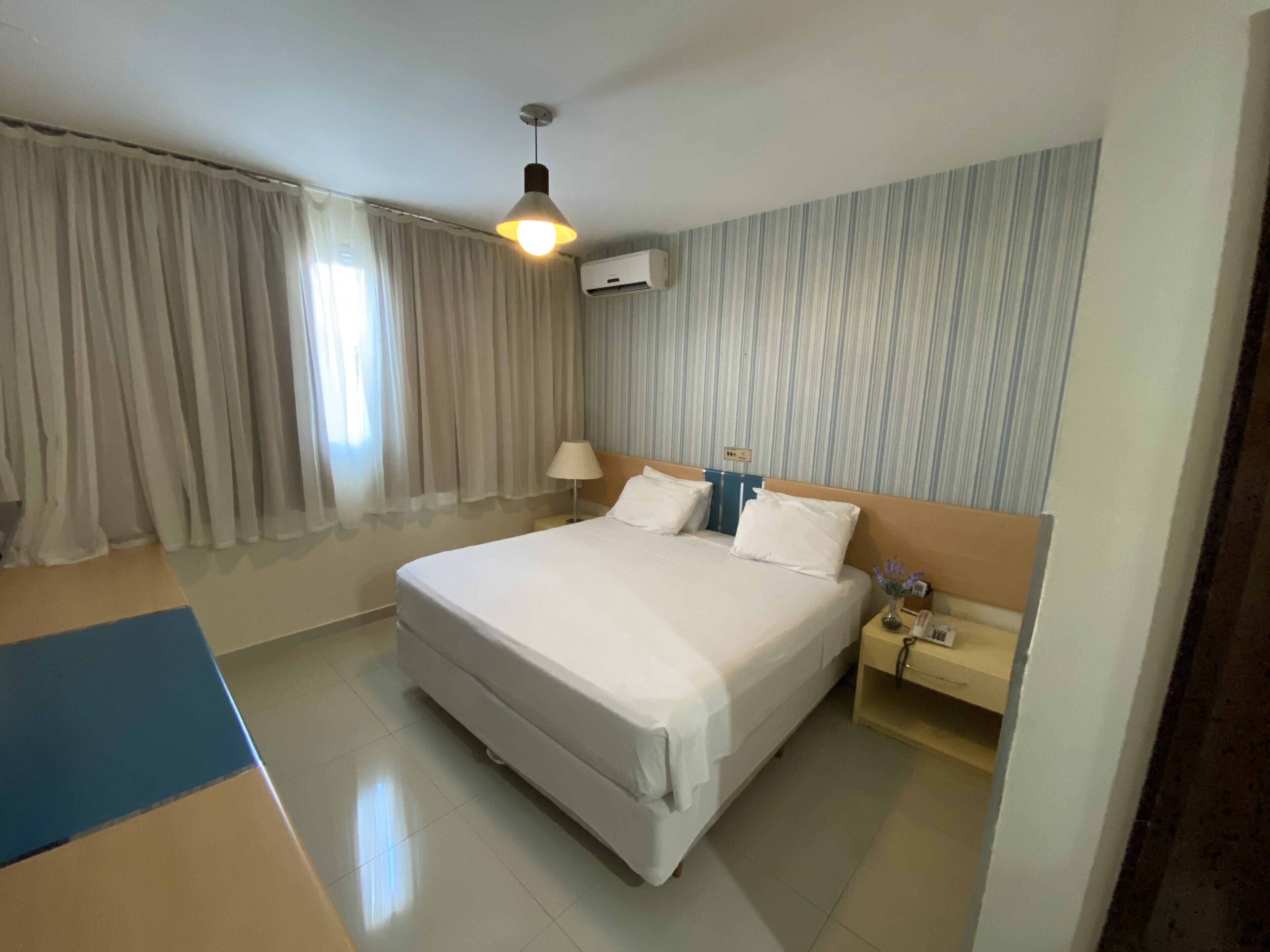 deluxe double room | minibar, desk, blackout curtains, soundproofing