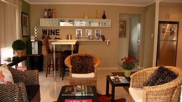 Three Bedroom Apartment  | Living area | Flat-screen TV, fireplace, DVD player, iPod dock