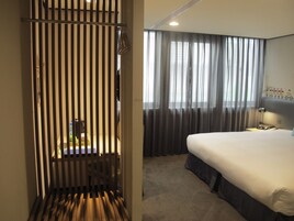 Deluxe tweepersoonskamer | Luxe beddengoed, donzen dekbedden, een kluis op de kamer
